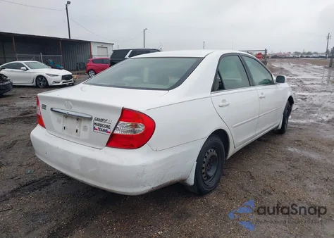 2002 Toyota Camry Le from USA, damaged, VIN JTDBE32K920110820